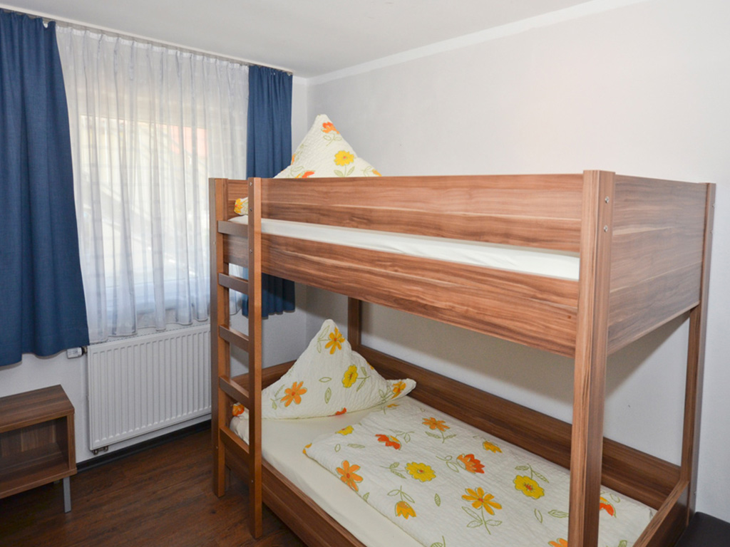 kinderschlafzimmer mit etagenbett der wohnung mondschein